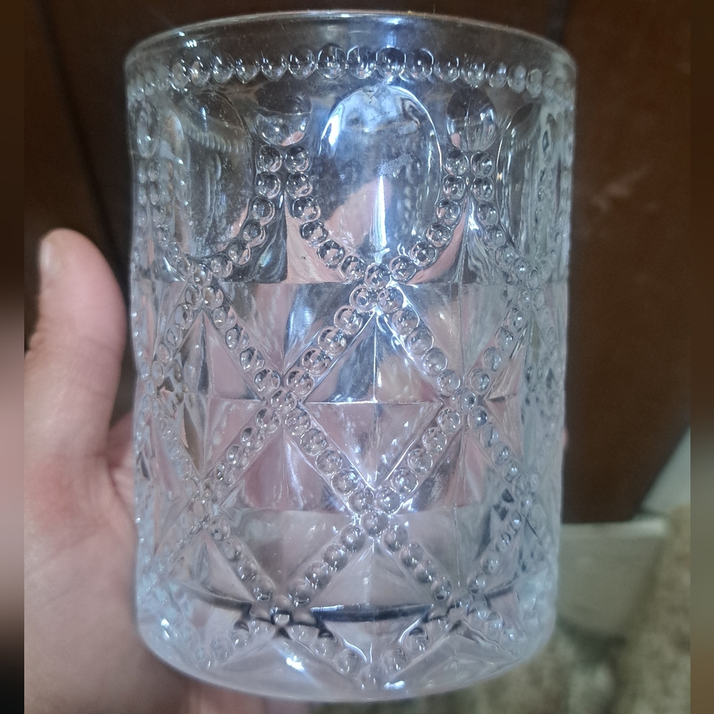 Clear Glass Cup with Intricate Design